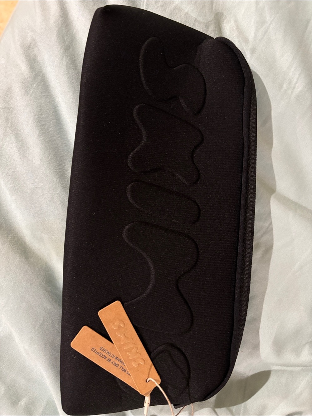 SKIMS Black Neoprene Cosmetic Pouch with Embossed Logo